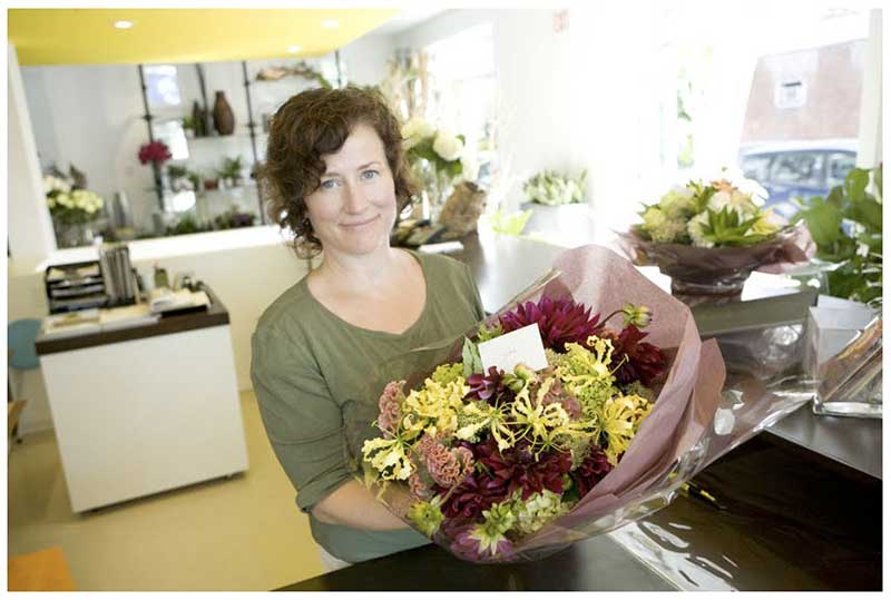 Photograph of Rosie, the one of Quince Flowers, FloristWare was the first floral POS system they ever used and they love it.