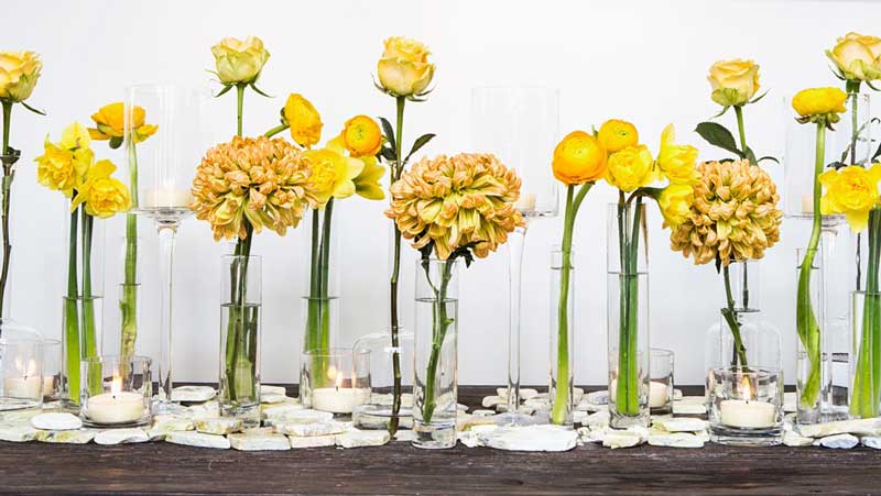 Beautiful display of yellow flowers from Quince, an upscale florist and FloristWare client.